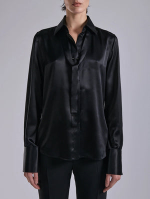 Black silk blouse, piercing