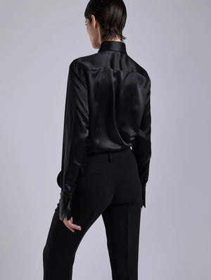 Black silk blouse, piercing