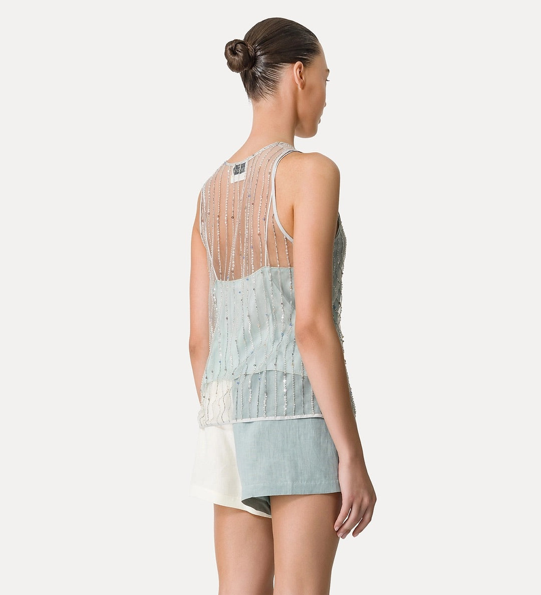 tulle top with embroidered “firefly” detailing