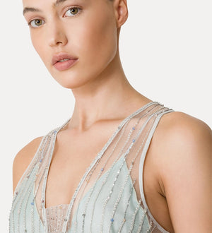 tulle top with embroidered “firefly” detailing